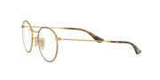 Gold eyeglass frames with round lenses and dark tortoise temple arms.