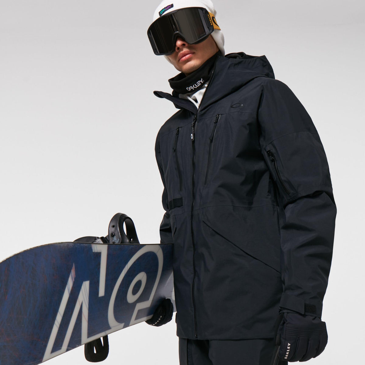 Black hooded shell jacket with full front zip and zip pocket details