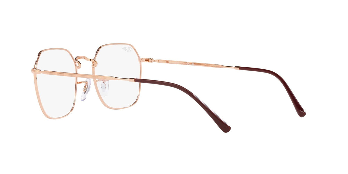 Prescription eyeglass frames with rose-gold front and dark brown temple arms