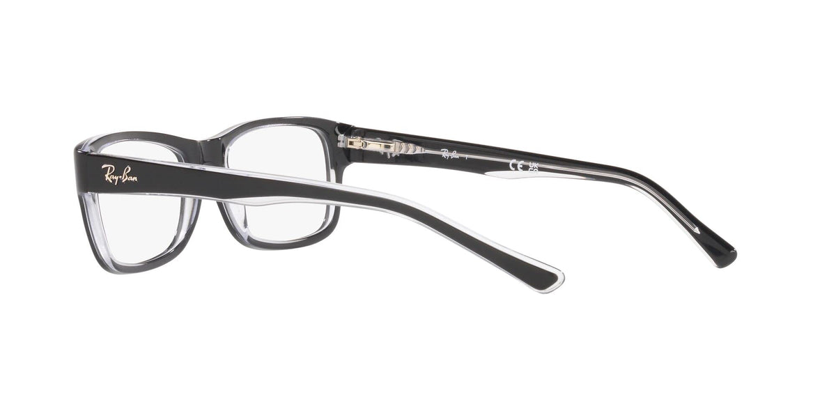 Gunmetal-black eyeglass frames, angled side view with clear demo lens and Ray-Ban logo