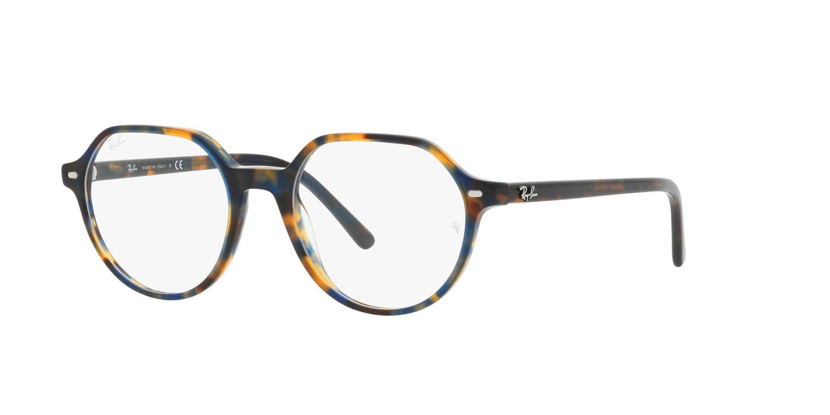 Ray-Ban prescription eyewear frames, side view with tortoise-pattern front and temple