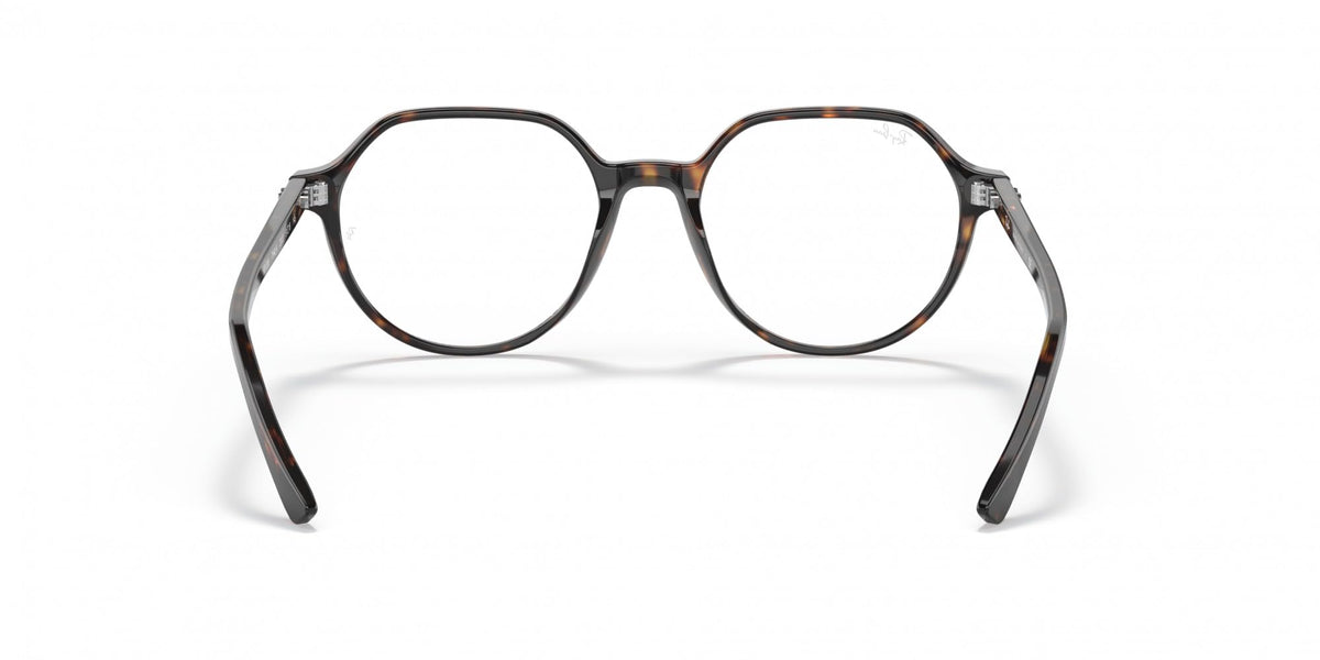 Ray-Ban prescription eyeglass frames with round lenses and tortoise-pattern rims