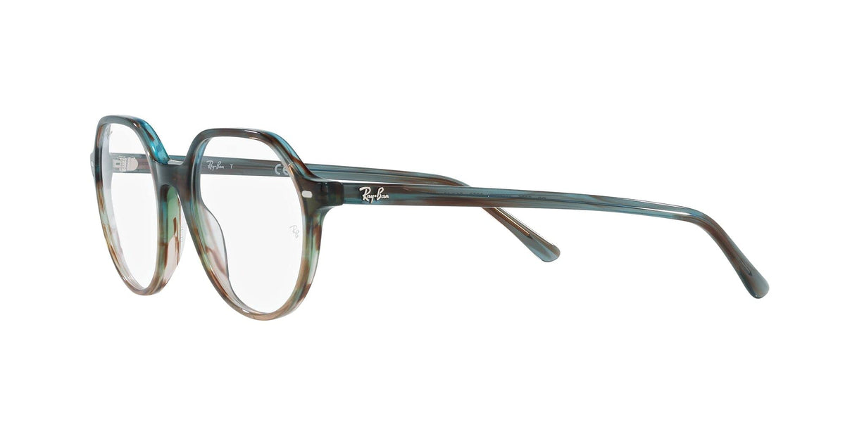 Blue-green round eyeglass frames with clear lenses and curved metal temples