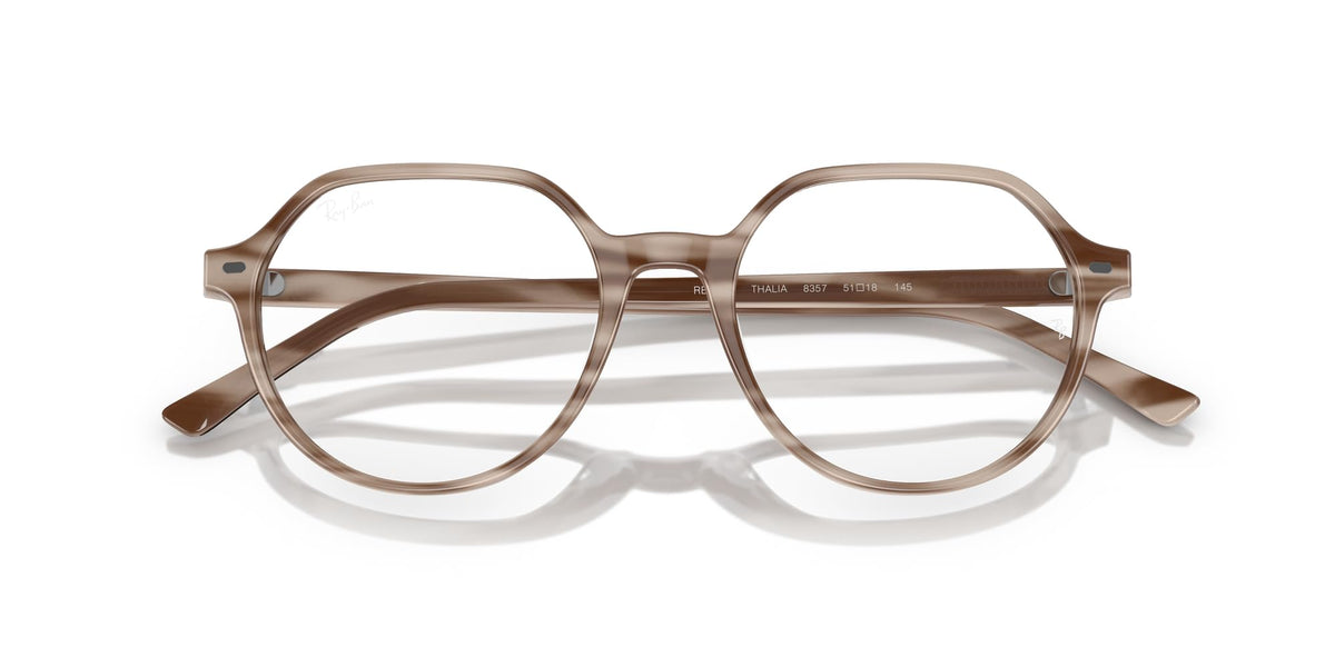 Havana brown prescription eyeglass frames, front view with clear round lens openings