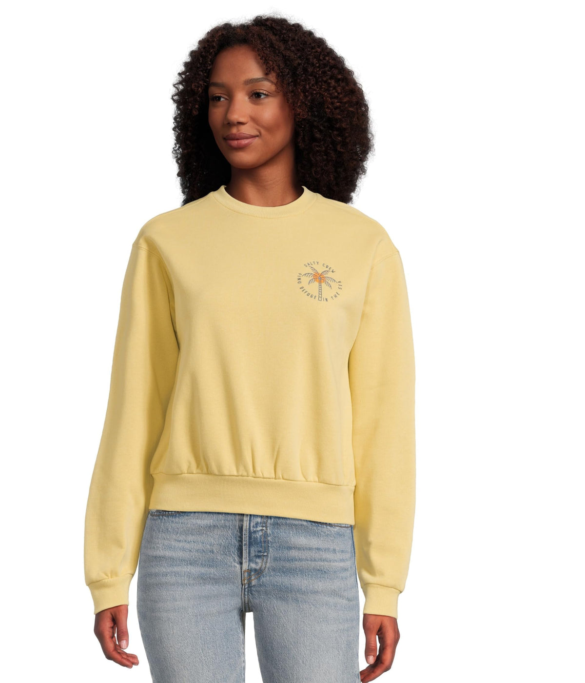 Women’s crewneck sweatshirt in dusty gold with small palm tree chest graphic