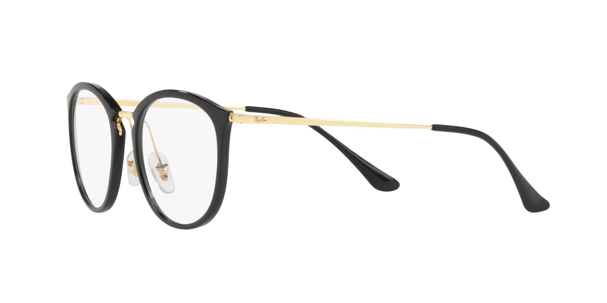 Black round prescription eyeglass frames with gold-tone metal temples and demo lenses