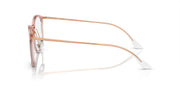 Rose pink round eyeglass frames with slim metal temples and demo lenses, side profile