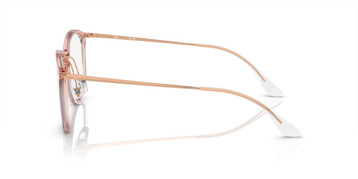 Rose pink round eyeglass frames with slim metal temples and demo lenses, side profile