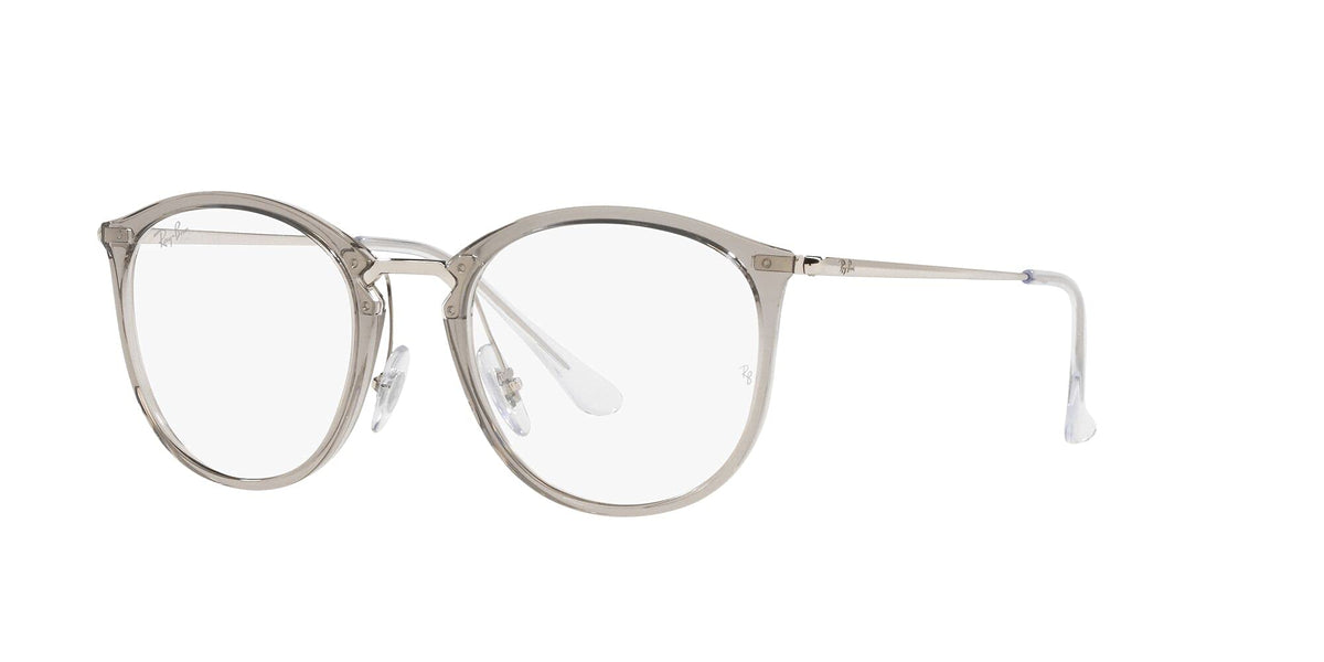 Round full-rim eyeglass frames with clear metal temples and demo lenses, dark detailing