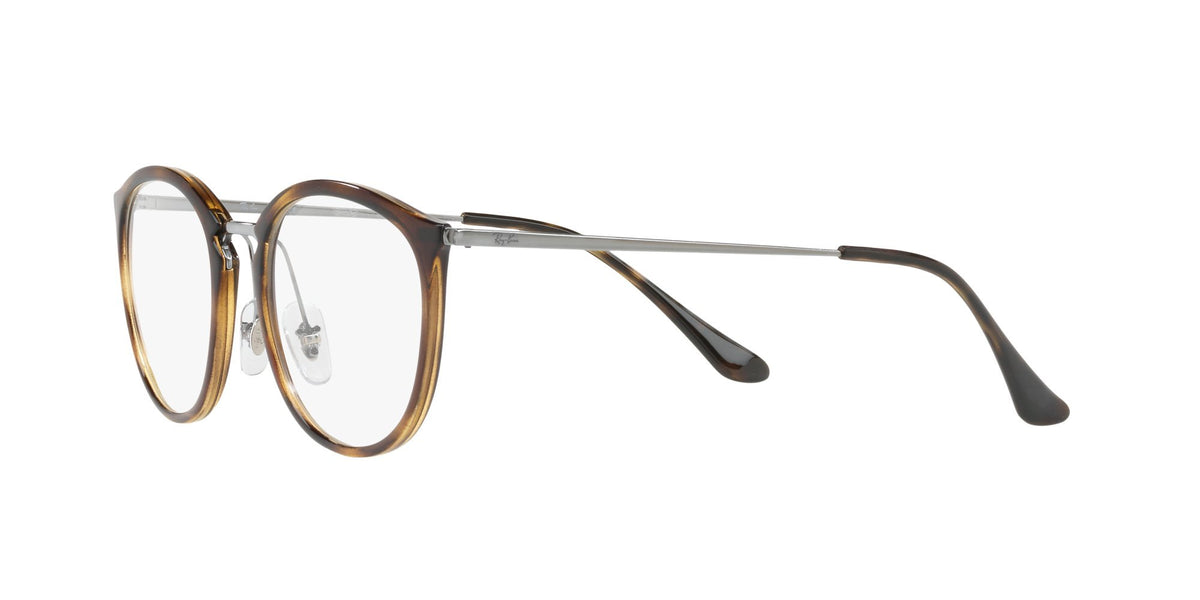 Havana brown prescription eyeglass frames with clear-tinted temples and clear demo lenses