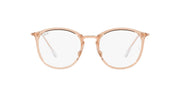 Round transparent light pink eyeglass frames with slim metal arms