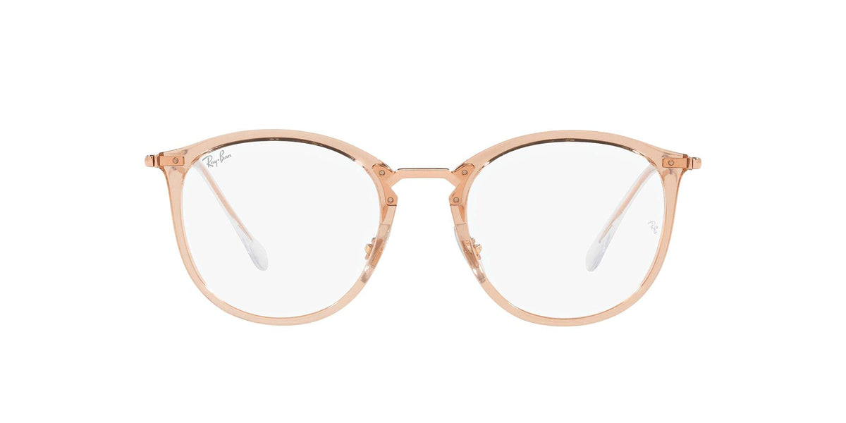 Round transparent light pink eyeglass frames with slim metal arms