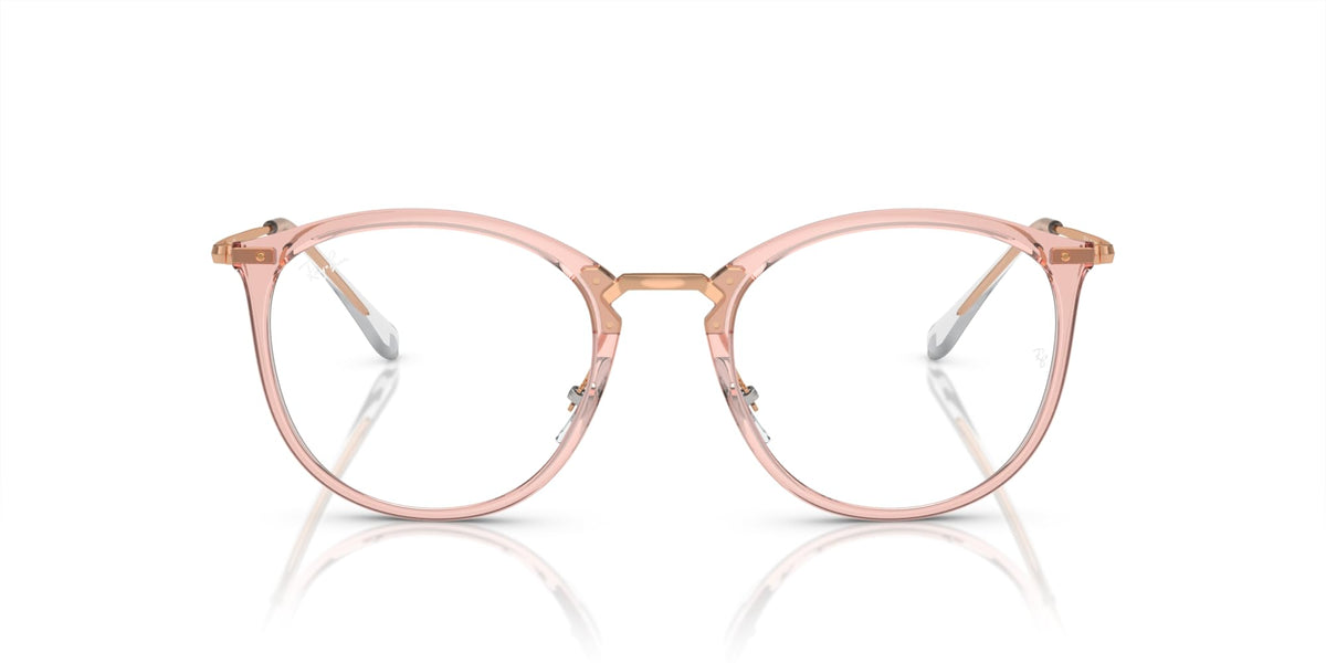 Round full-rim eyeglass frames in rose pink with metal hinges and demo lenses
