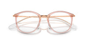 Rose pink round eyeglass frames with demo lenses and curved bridge, angled view