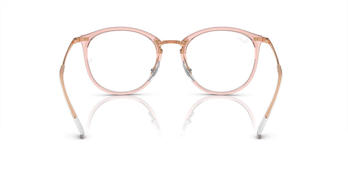 Rose pink round eyeglass frames with metal detailing and demo lenses, front view