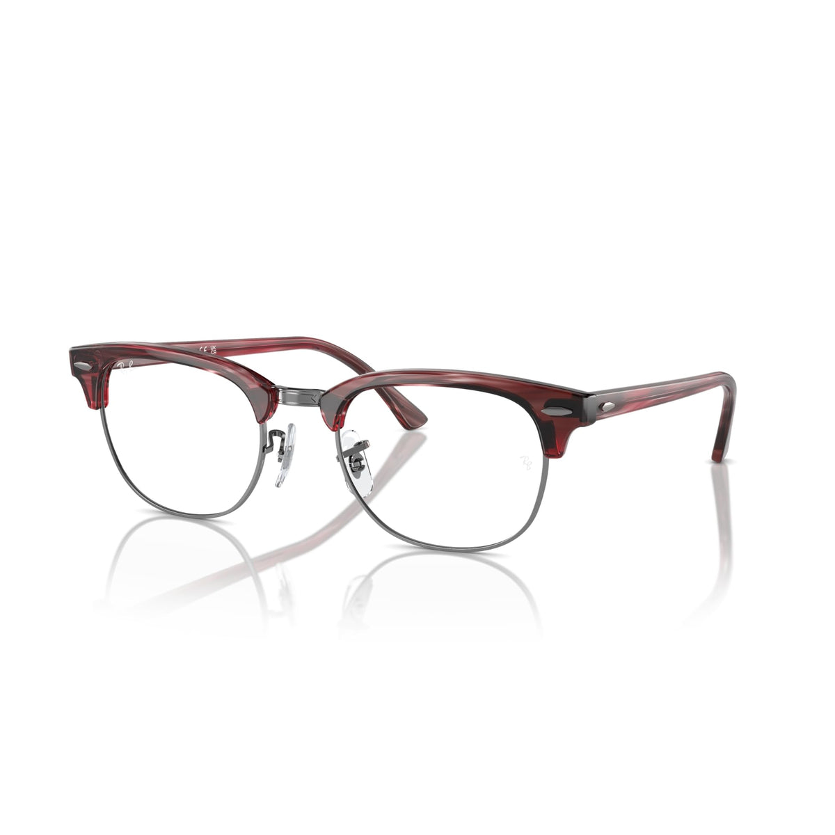 Red-brown tortoise prescription eyewear frame with clear lenses and rounded front