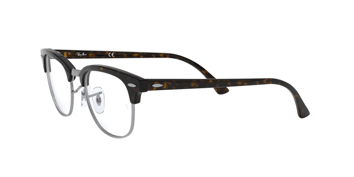 Prescription eyewear frame with dark face and patterned temple arms
