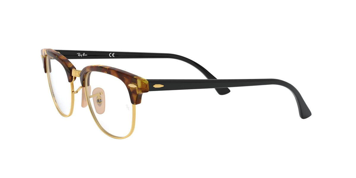 Tortoise and black prescription eyewear frames in side profile with clear lenses
