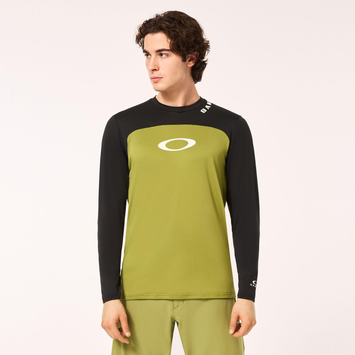 Oakley long sleeve cycling jersey, black shoulders with lime-green center panel and chest logo