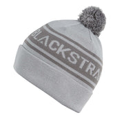 Light gray pom beanie with white logo stripe and ribbed knit