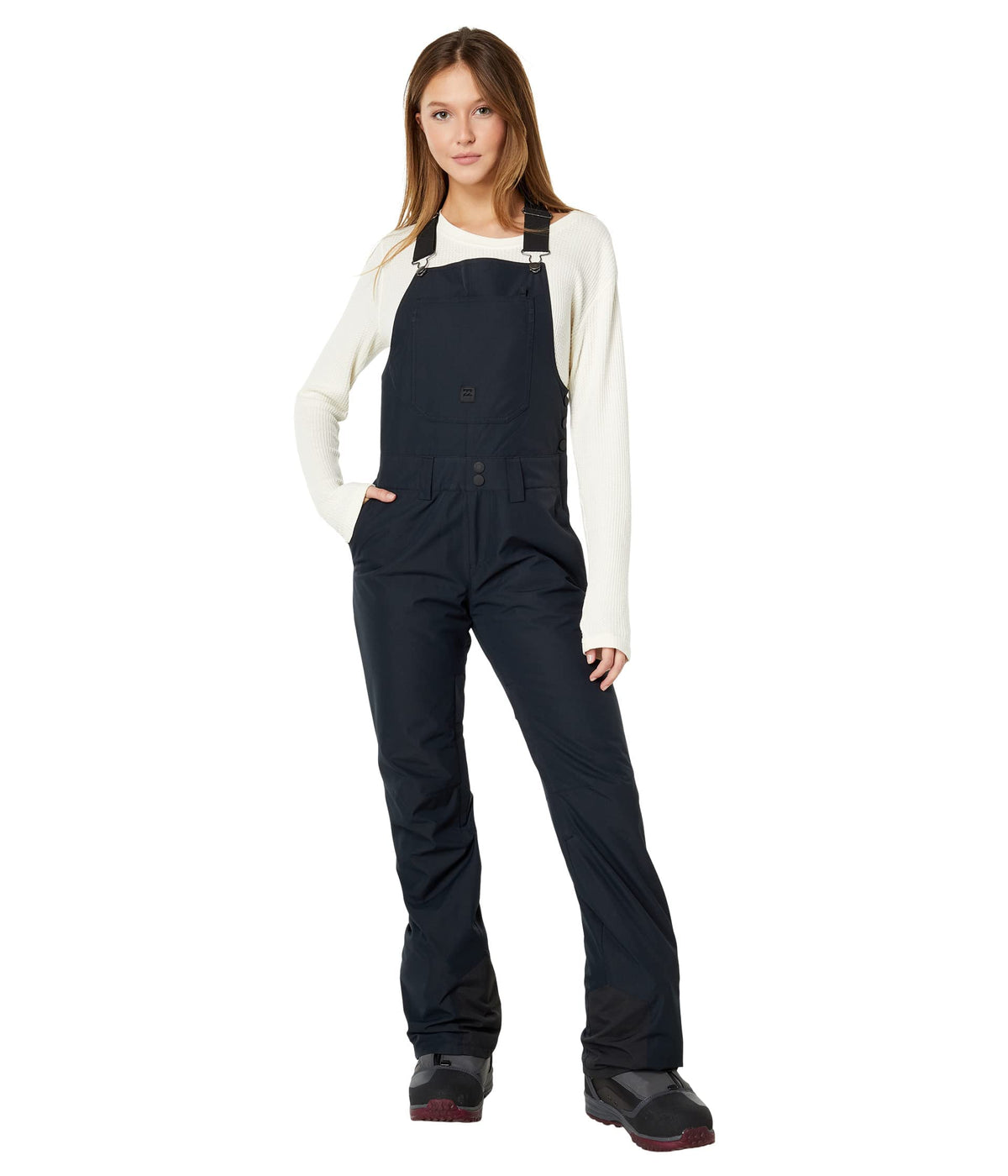 Black bib snow pants with front straps and roomy pockets