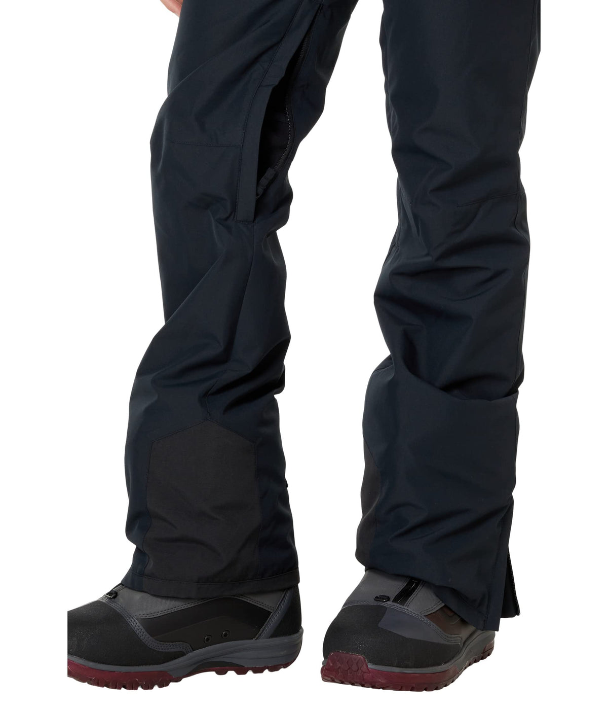 Black bib snow pants leg with ankle gaiter and boot