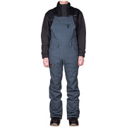 Women’s slate snowboard shell bib overalls with front pockets and adjustable straps