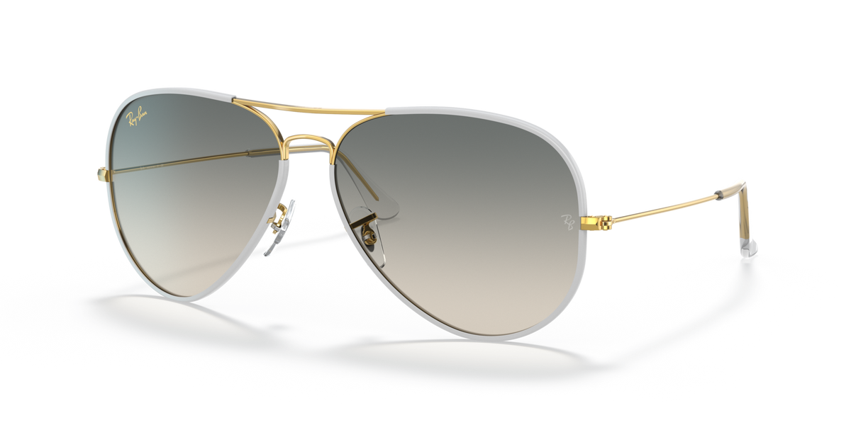 Ray-Ban RB3025JM aviator sunglasses, gold frame, grey gradient lenses, clear tips