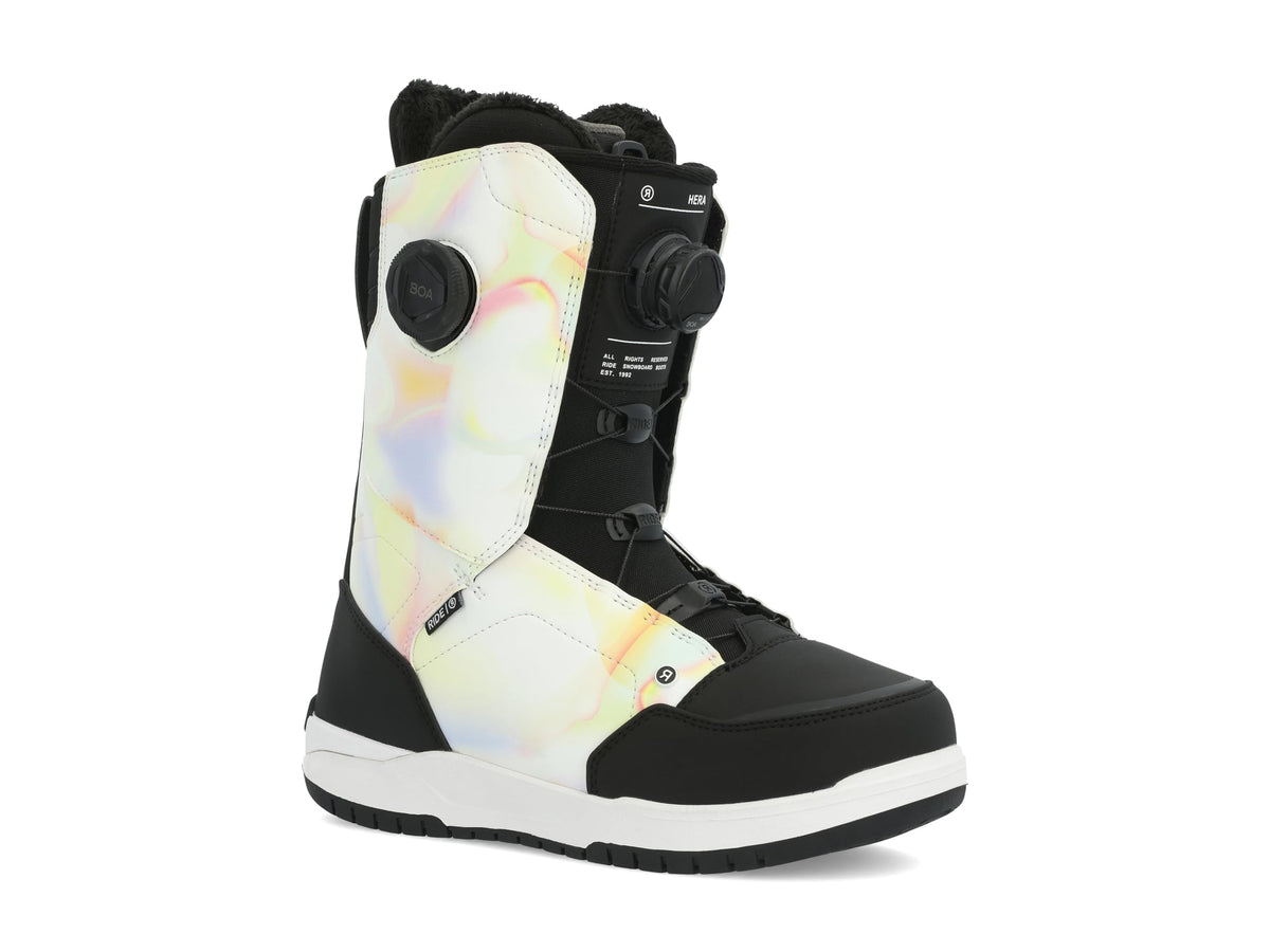Women's snowboard boots, side view: white iridescent upper with black lower and dial