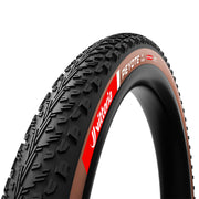 29 in tubeless bike tire showing sidewall logo, black tread with brown striping