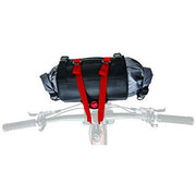 Black dry bike handlebar roll bag with red straps and top buckle closures
