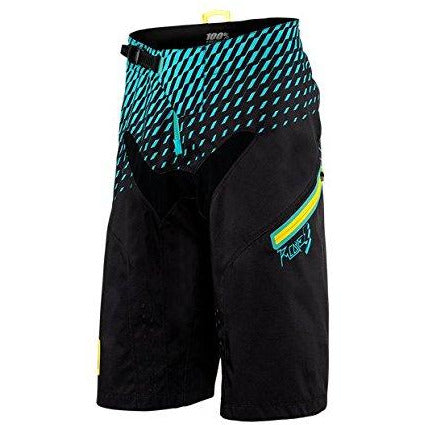 Black MTB shorts with cyan geometric side panel and logo patch