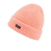 Pink knit beanie with Dakine logo label at cuff